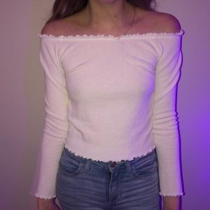 Cream long sleeve over the shoulder top